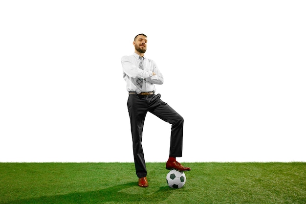 Free photo full length shot of a young businessman playing football isolated on white wall