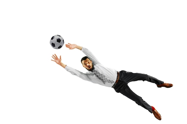 Free photo full length shot of a young businessman playing football isolated on white wall