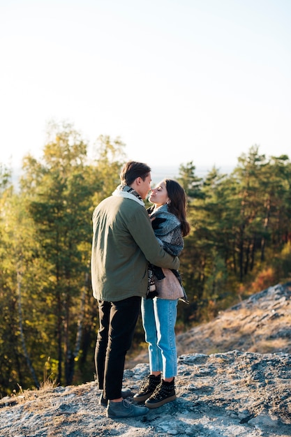 Free photo full shot adorable couple outdoors