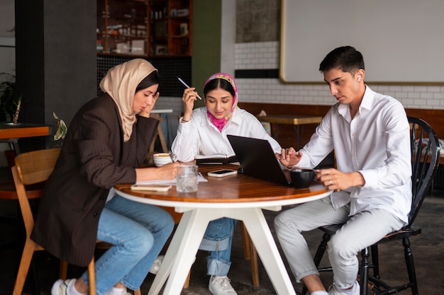 Full shot arab people spending time together