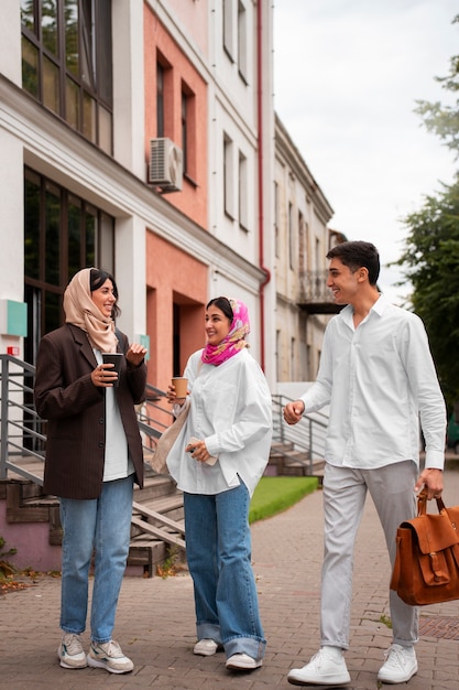 Full shot arab people spending time together