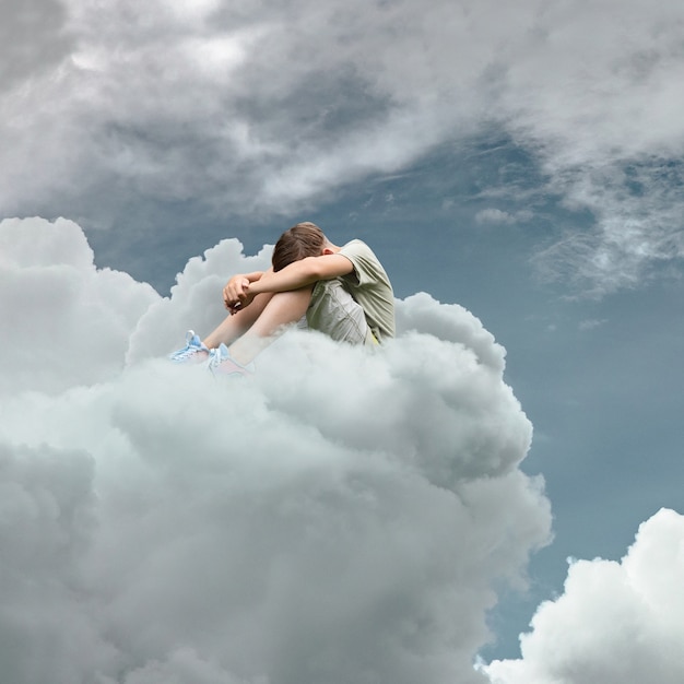 Free Photo full shot boy sitting on cloud