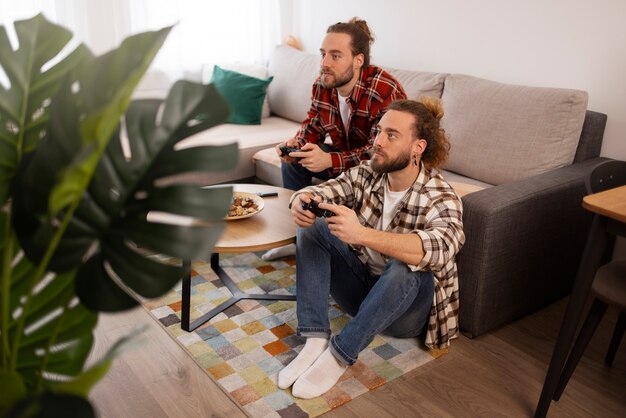 Full shot brothers playing videogames