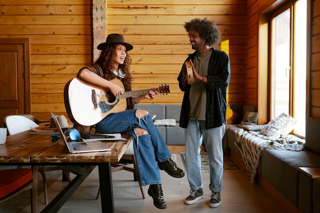 Full shot country musicians indoors