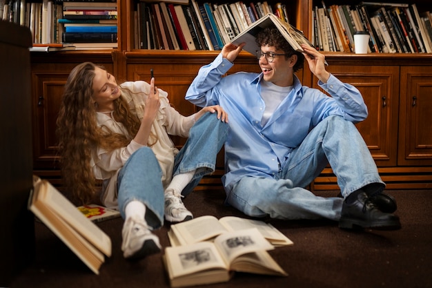 Full shot couple having a bookstore date