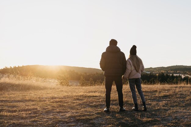 Full shot couple outdoors