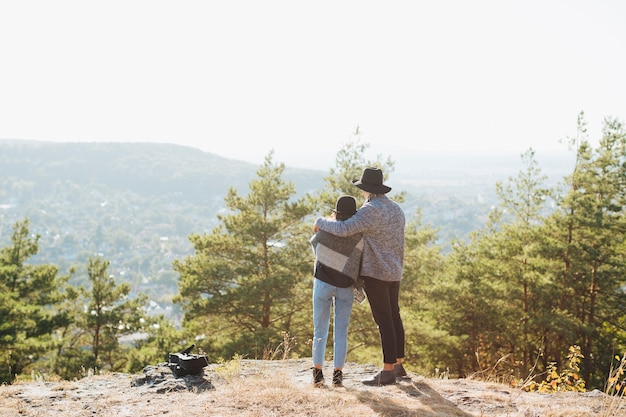 Full shot couple together outdoors