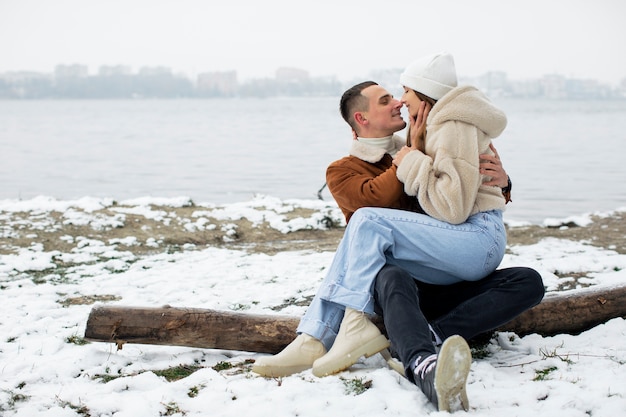 Free photo full shot cute couple winter time