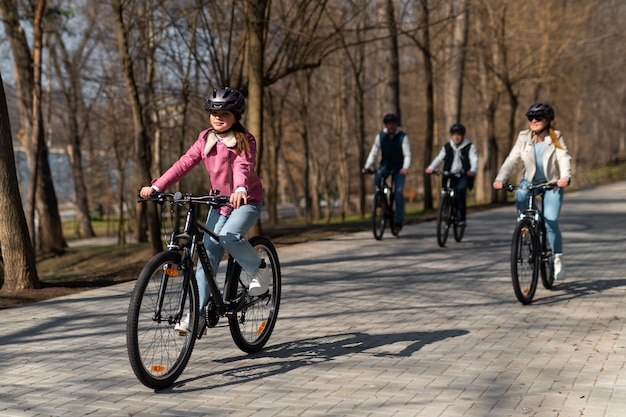 Full shot family cycling together