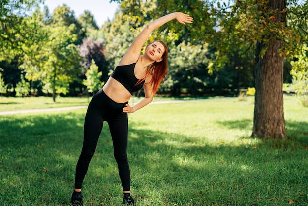 Full shot fit woman exercising