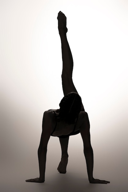 Full shot flexible woman posing