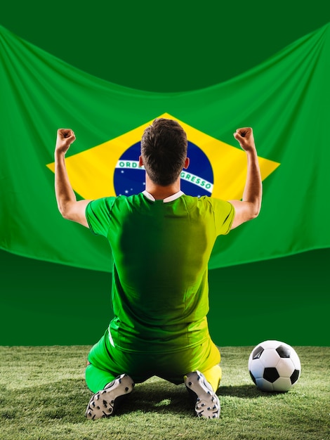 Free photo full shot football player with brazilian flag