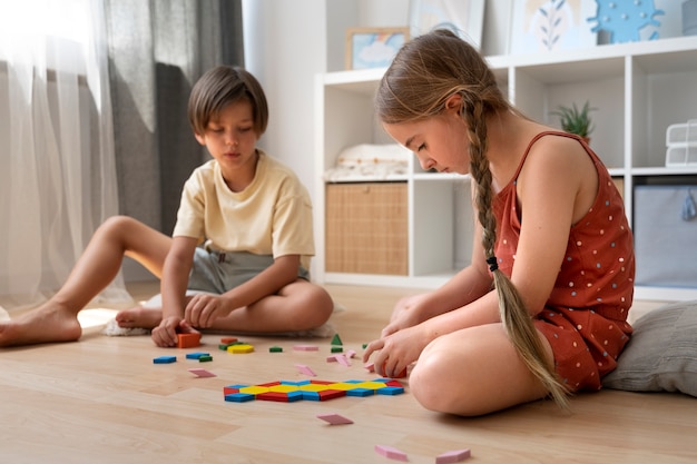 Full shot friends making puzzle together