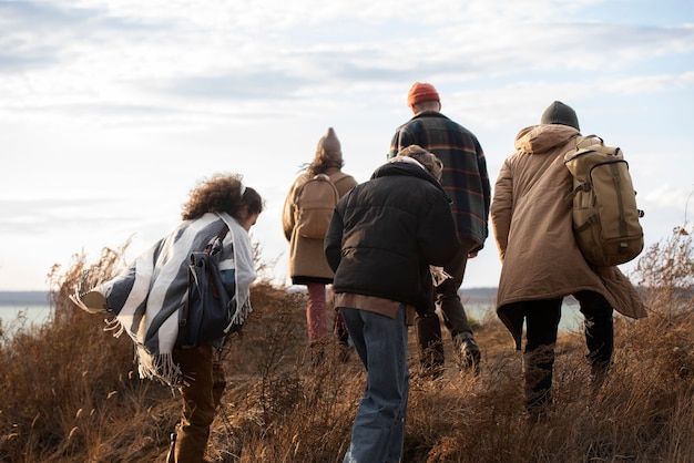 Free photo full shot friends walking together