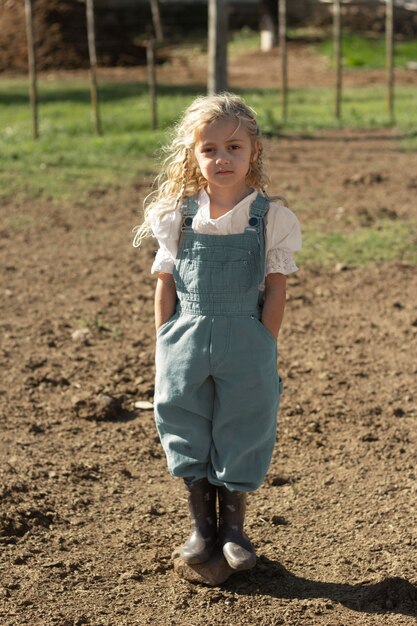 Full shot girl at farm