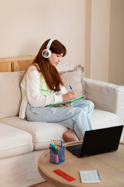 Full shot girl with headphones