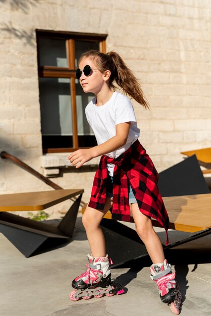 Full shot of girl with roller blades