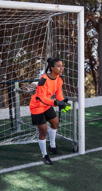 Full shot goalkeeper with football gate