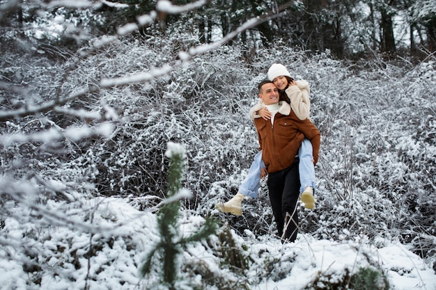 Full shot happy couple outdoors