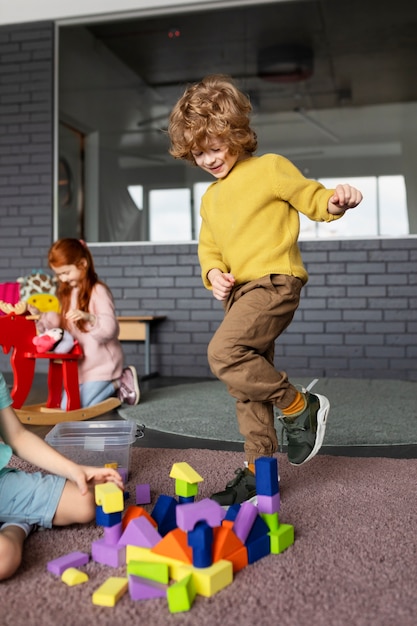 Full shot happy kid jumping