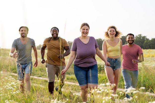 Free photo full shot happy people outdoors