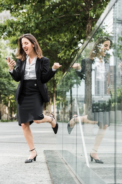 Full shot happy woman outdoors