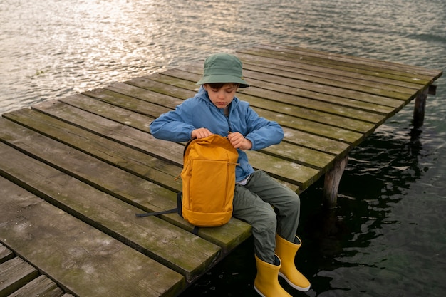 Free Photo full shot kid exploring natural environment