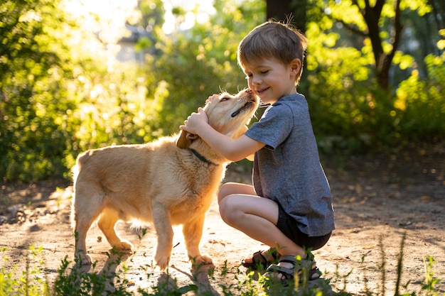 Full shot kid hugging dog