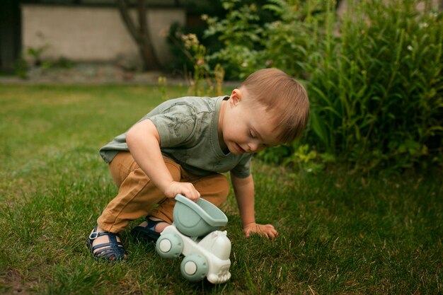 Full shot kid playing outdoors