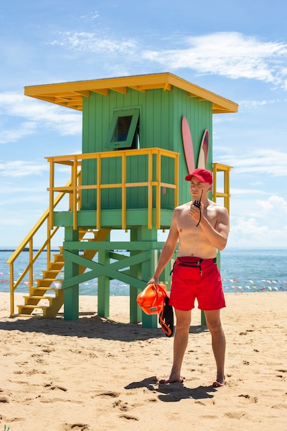 Free photo full shot lifeguard doing his job