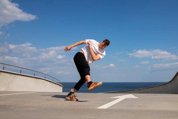 Full shot man doing  parkour training