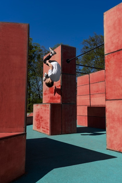 Free Photo full shot man doing parkour