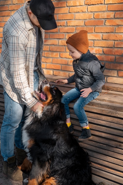 Free Photo full shot man, kid and dog rural life