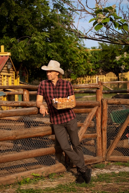 Full shot man living at farmhouse