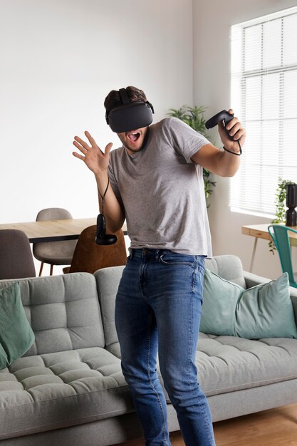 Full shot man playing indoors