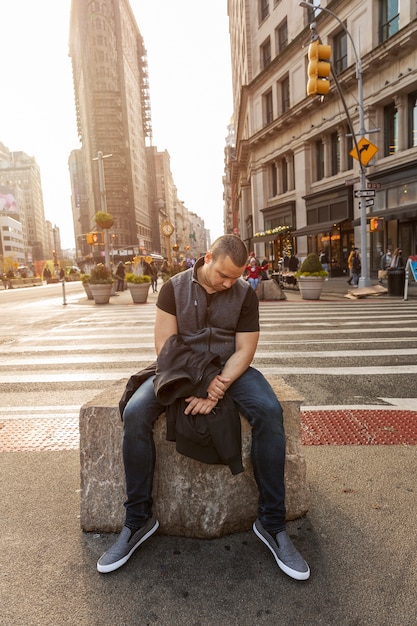 Full shot man sleeping on bench