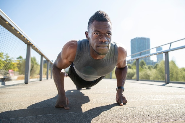 Full shot man training on ground