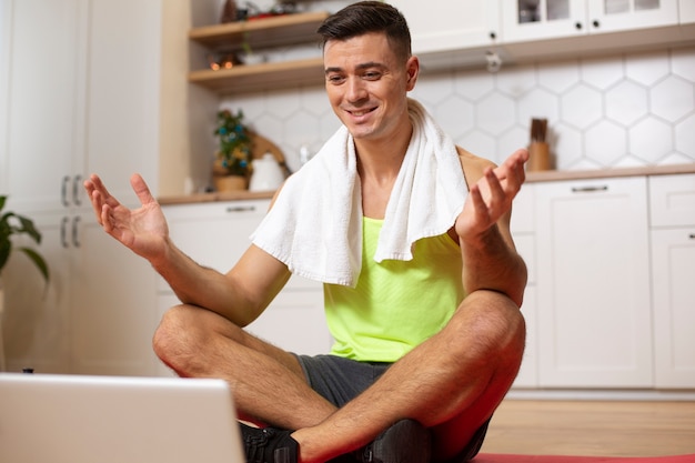 Full shot man with towel