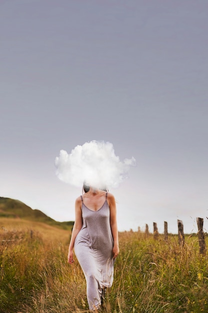 Full shot model posing with cloud-shaped head