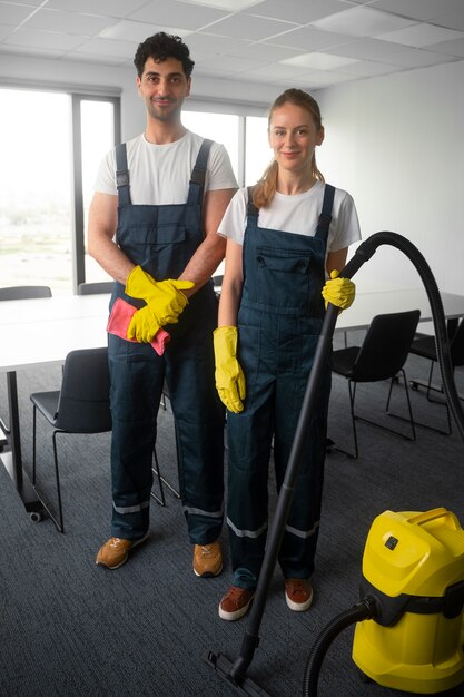 Full shot people cleaning office