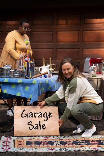 Free Photo full shot people at garage sale