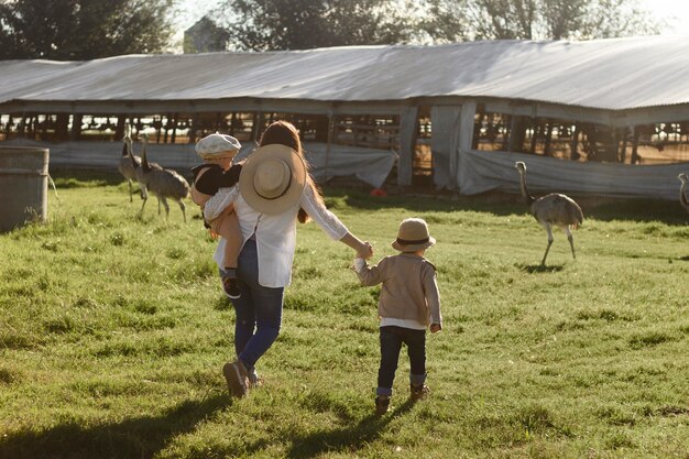 Full shot people living at farm