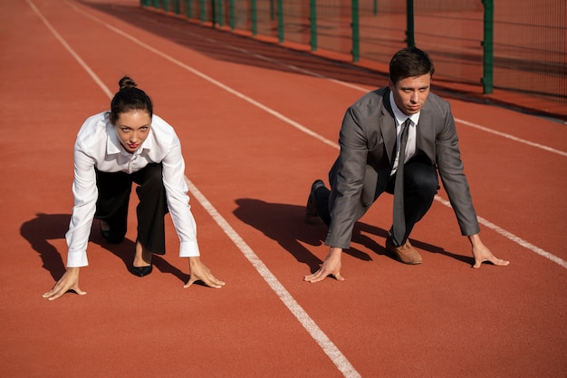 Free Photo full shot people running in suits