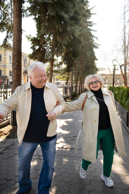 Full shot senior people walking together