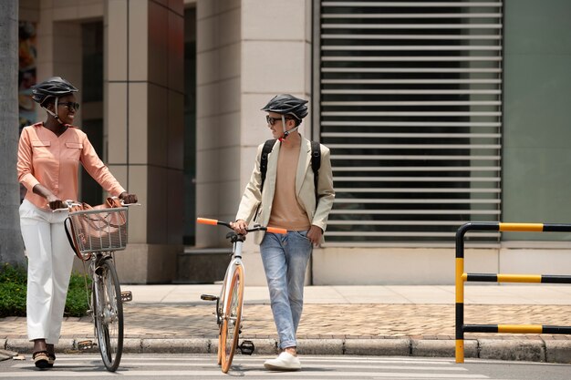 Full shot smiley people with bicycle