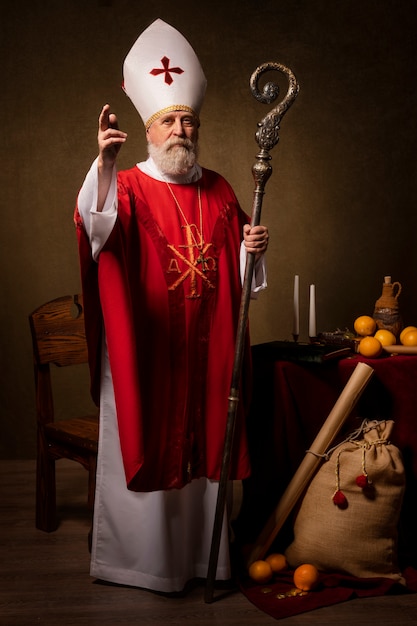 Free Photo full shot st nicholas holding cane