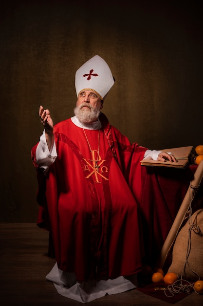 Free Photo full shot  st nicholas with book