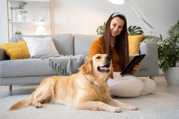 Full shot woman and cute dog