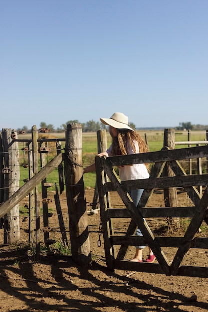 Full shot woman at farm