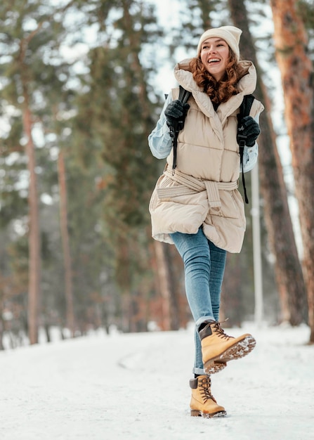 Free Photo full shot woman forest hiking